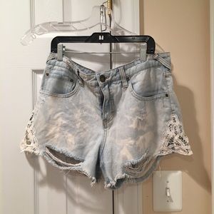 Distressed denim shorts
